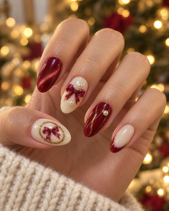 Golden Cameo hand-painted press-on nails — on an adult hand. Design preview.