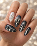 Silver Skyline hand-painted press-on nails worn on a hand, design preview