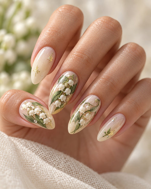 Lily Reverie hand-painted press-on nails — on an adult hand. Design preview.