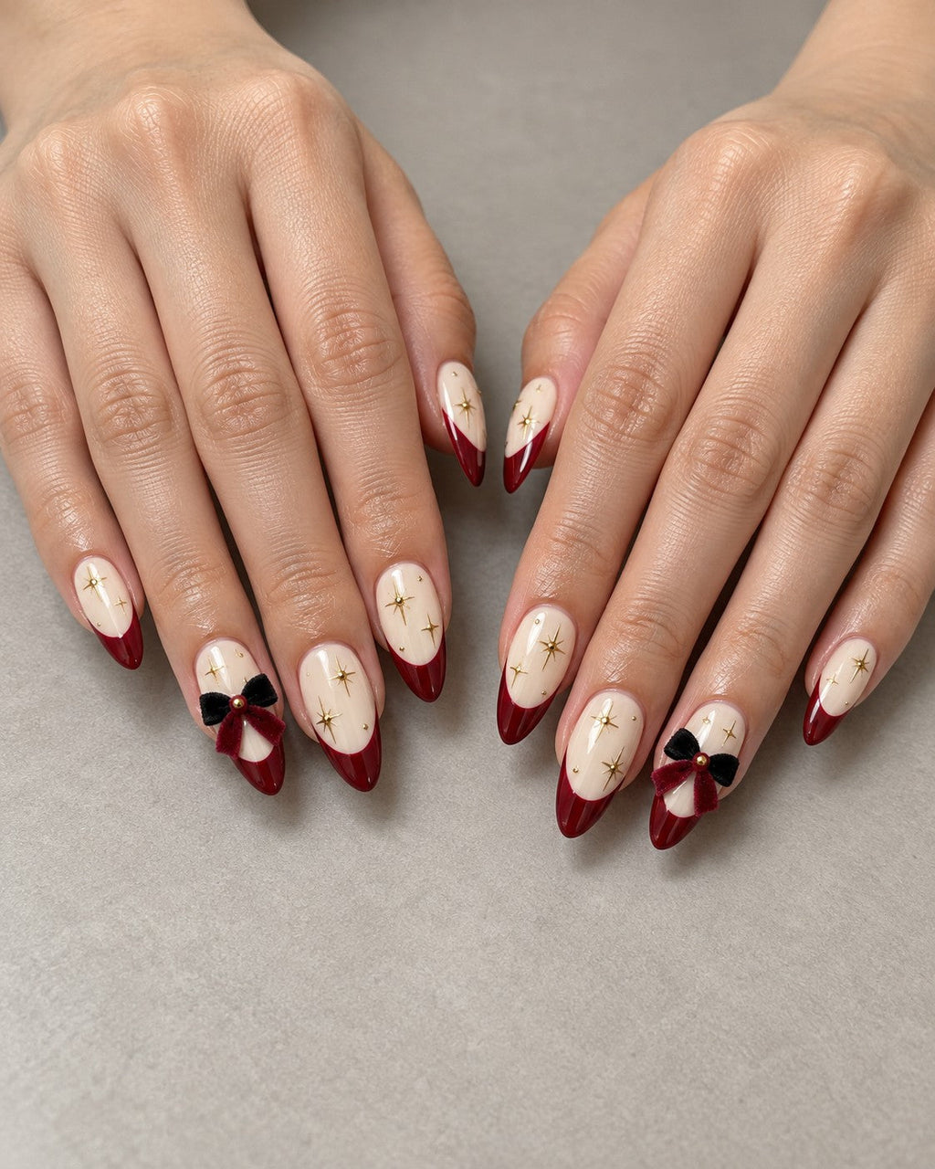 Christmas Red French Bow Hand-Painted Press-On Nails — on a hand, AI design preview