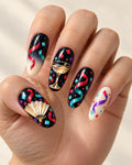 Confetti Nocturne hand-painted press-on nails — hand worn
