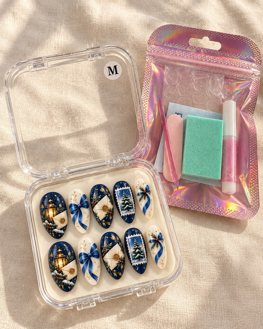Midwinter Letter ten-nail set in a clear case beside application kit, design preview