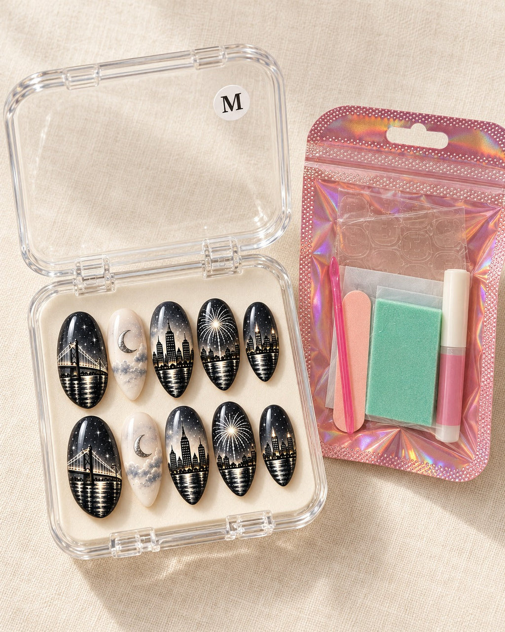 Silver Skyline ten-nail set in a clear case beside application kit, design preview