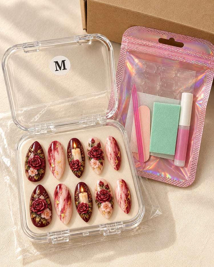Candlelit Promise hand-painted press-on nails — in clear case beside application kit. Design preview.